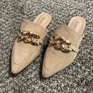 Suede mules with gold embellishment